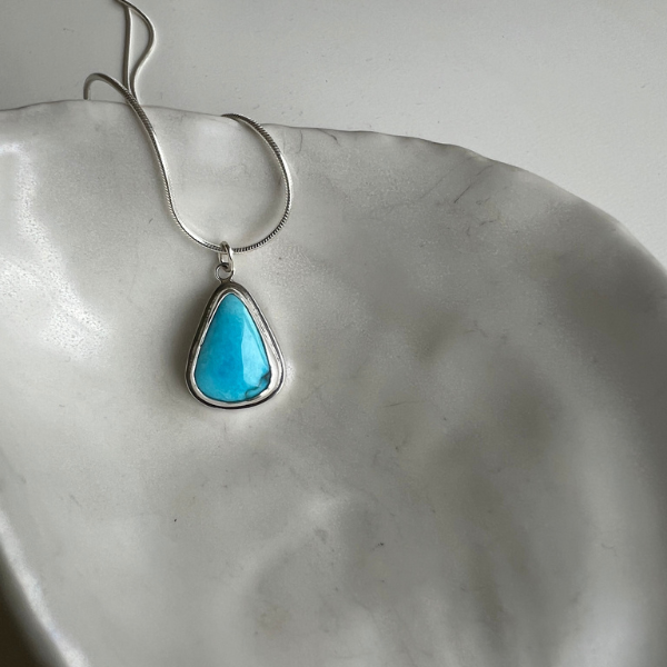 Sleeping Beauty Triangular Turquoise & Silver Pendant on Snake Chain