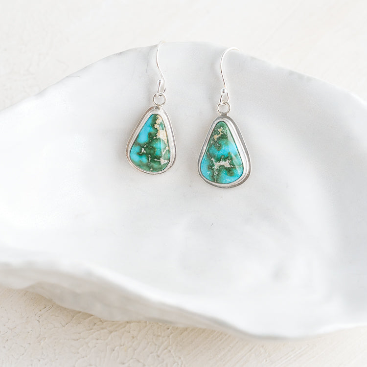 Blue and Green turquoise dangly handmade earrings set in silver.  Handmade by Laura De Zordo Jewellery