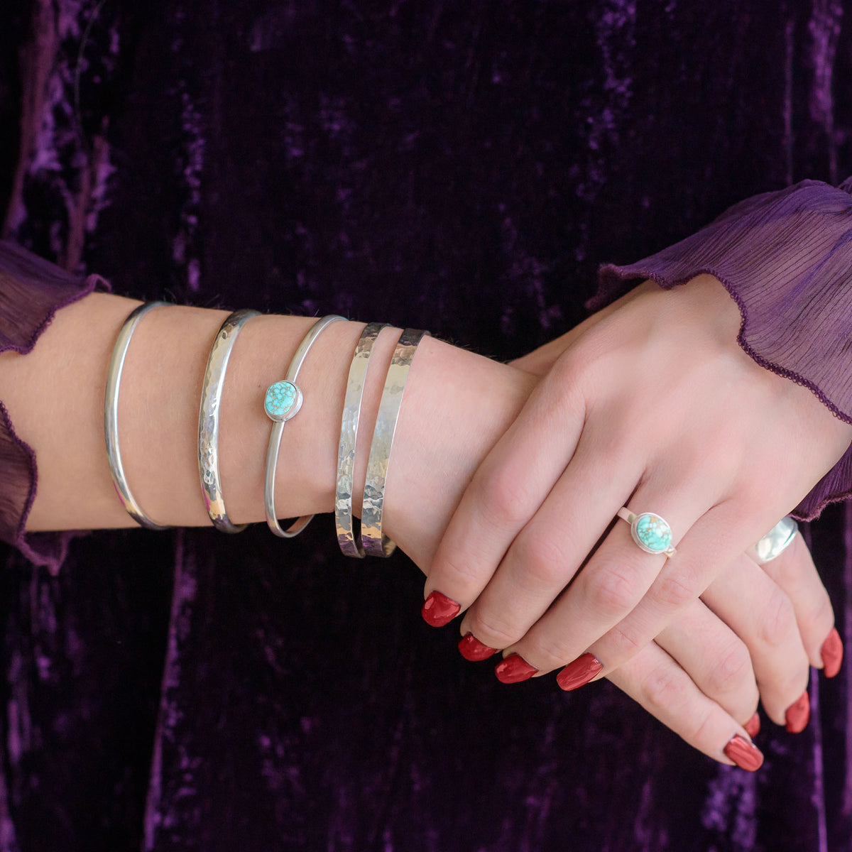 Turquoise and silver stacking cuff and silver bangles.  Handmade in the UK by Laura De Zordo Jewellery