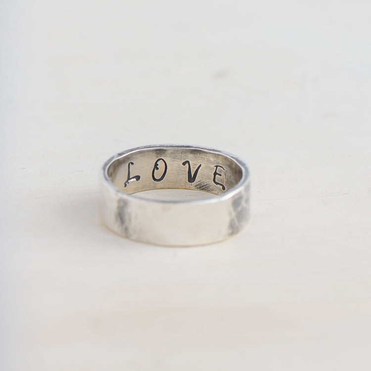 Handmade sterling silver hammered 'Message' Rings.