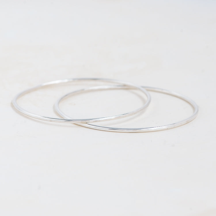 Sterling Silver Micro Mini Bangle. Handmade in the UK  by Laura De Zordo