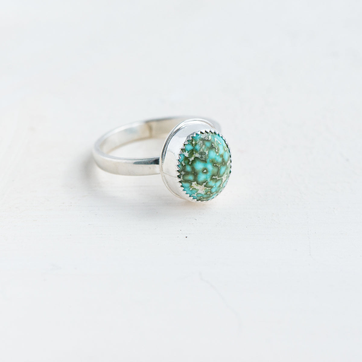 Sonoran Turquoise with Serrated Surround and Thin Silver Ring