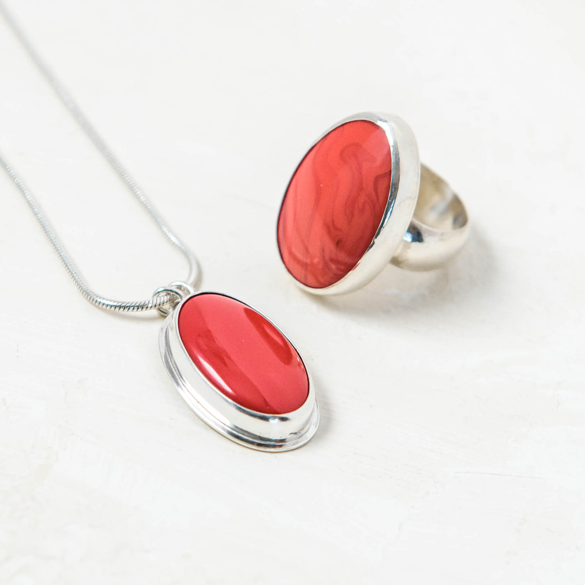 Red Rosarita oval and silver pendant and rosarita and silver ring large. Handmade by laura de zordo jewellery