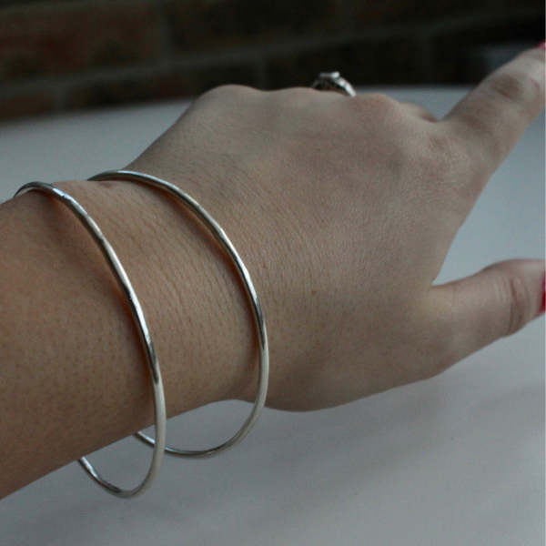 Sterling Silver Micro Mini Bangle. Handmade in the UK  by Laura De Zordo
