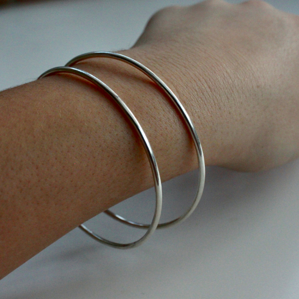 Sterling Silver Micro Mini Bangle. Handmade in the UK  by Laura De Zordo